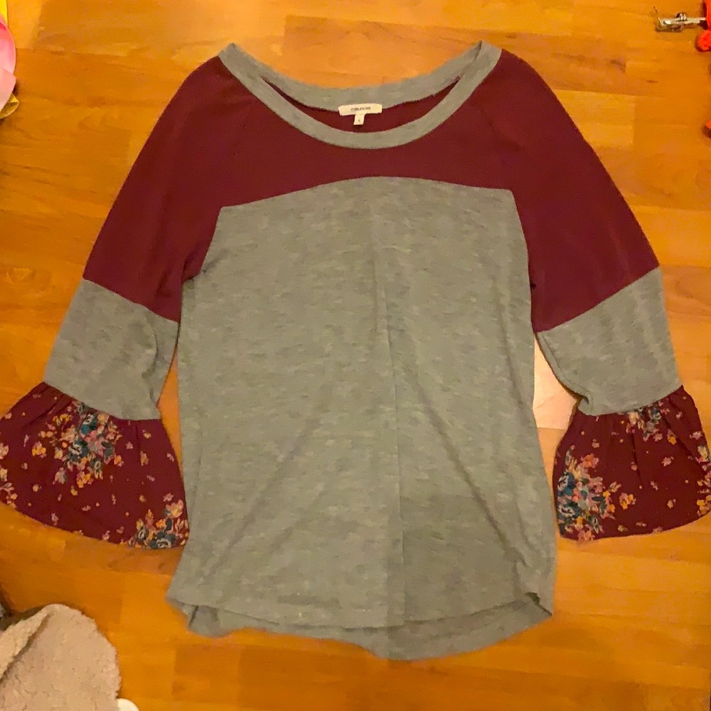 This is a casual/dress up shirt, with bell bottom flare out arms.